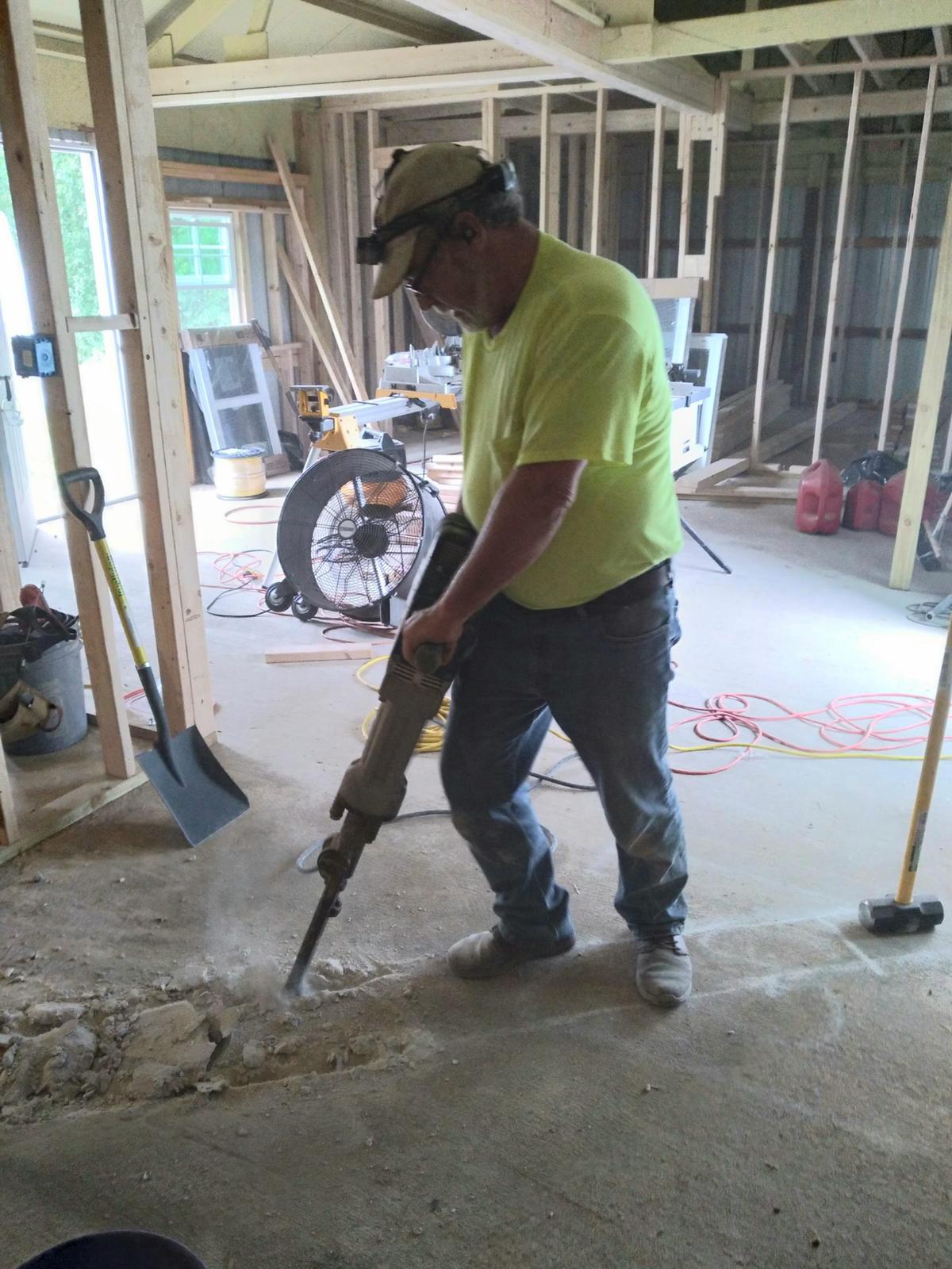 And the only way to get drain pipes under a pre-existing cement pad, Jack hammers!