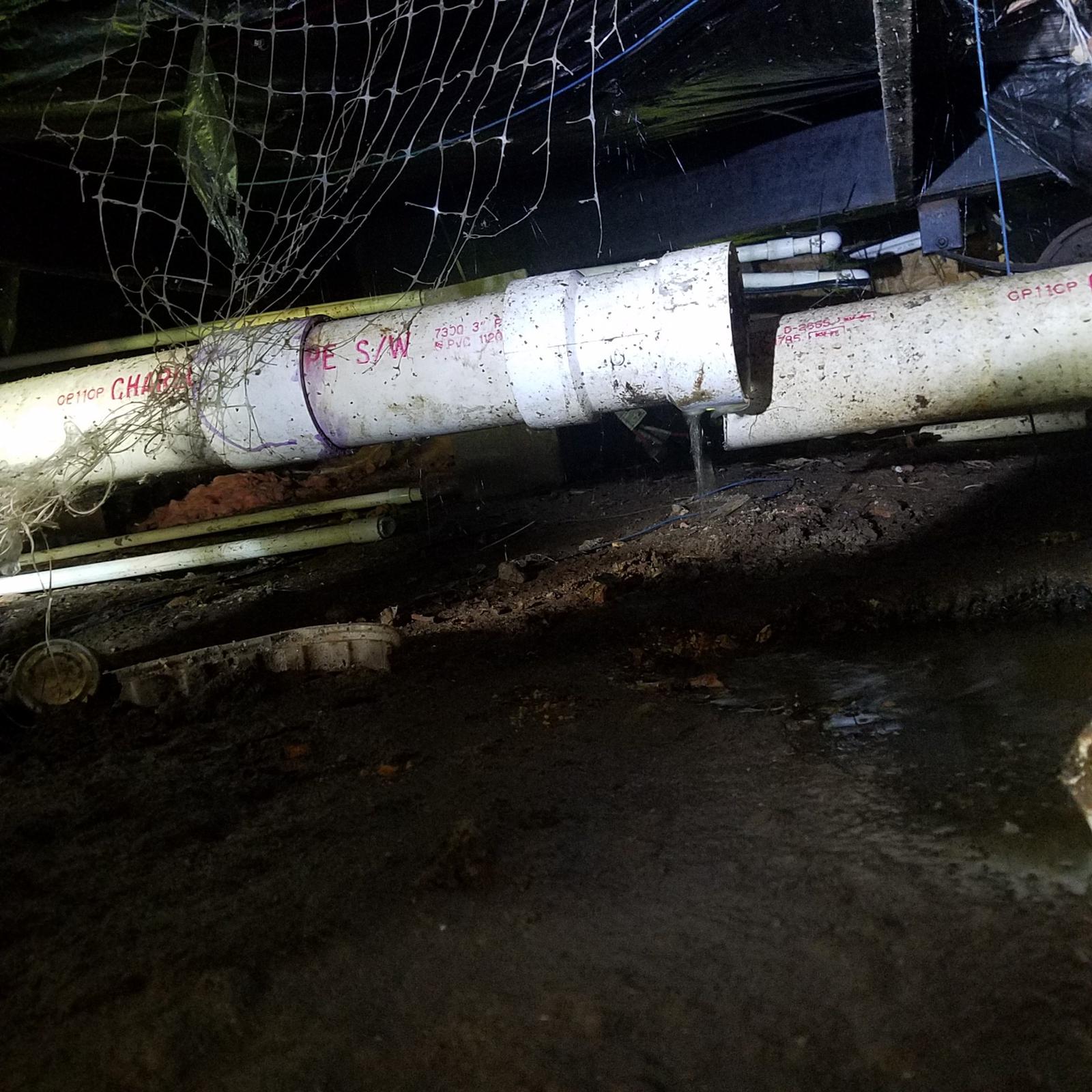 Here\'s a separated main drain under a house. It was a challenging job to say the least!