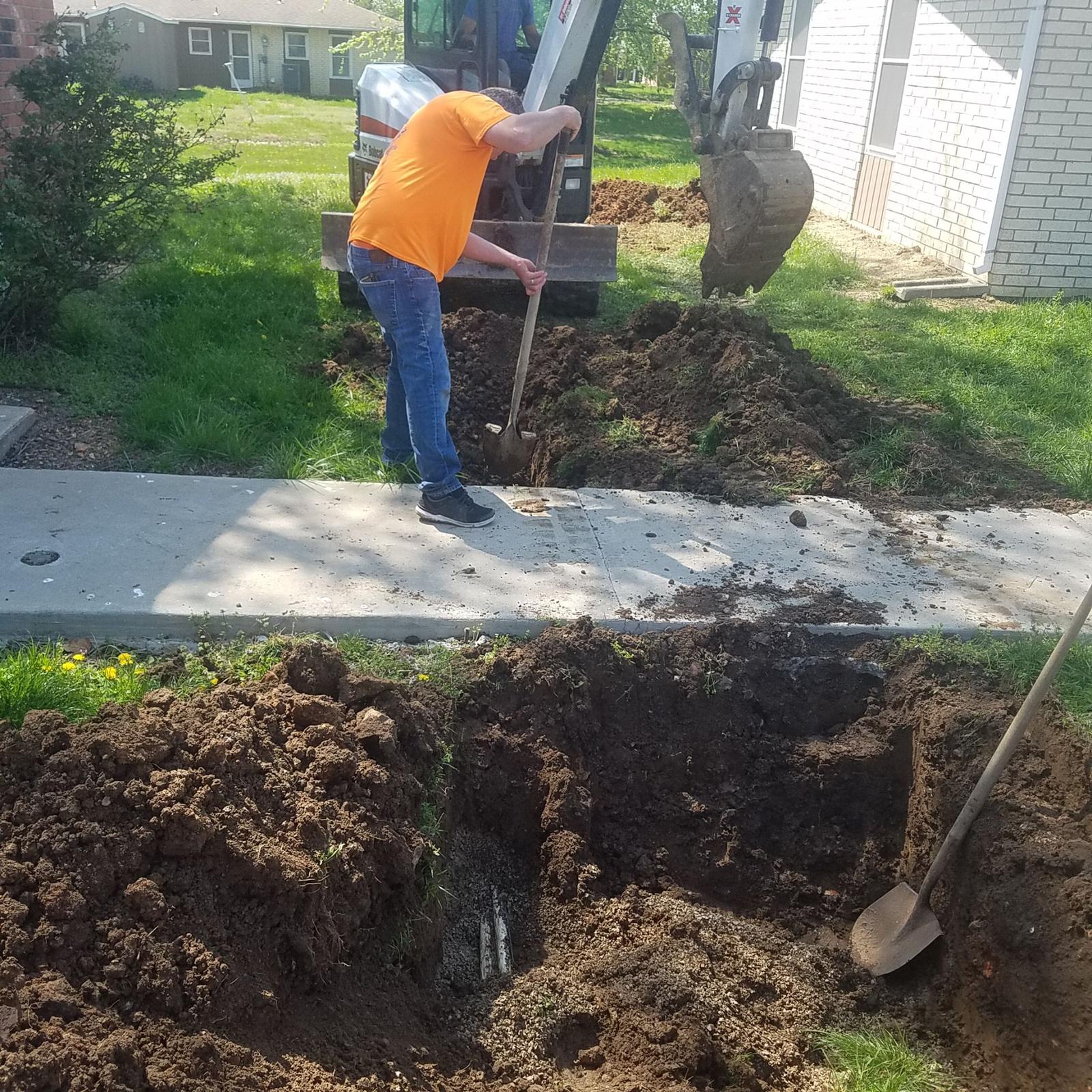 Actually, fixing a leak is the EASY part of plumbing. Finding the leak and getting to it is the hardest part. This pipe happened to burst under a sidewalk. This is randy doing his impression of a backhoe, lol. 