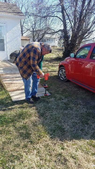 This is Randy locating a sewer line underground. We have the ability to run a camera down a sewer line to see inside the pipes. The camera head also sends out a signal that can be picked up by the wand he is holding. We know exactly where and how deep the pipe is.