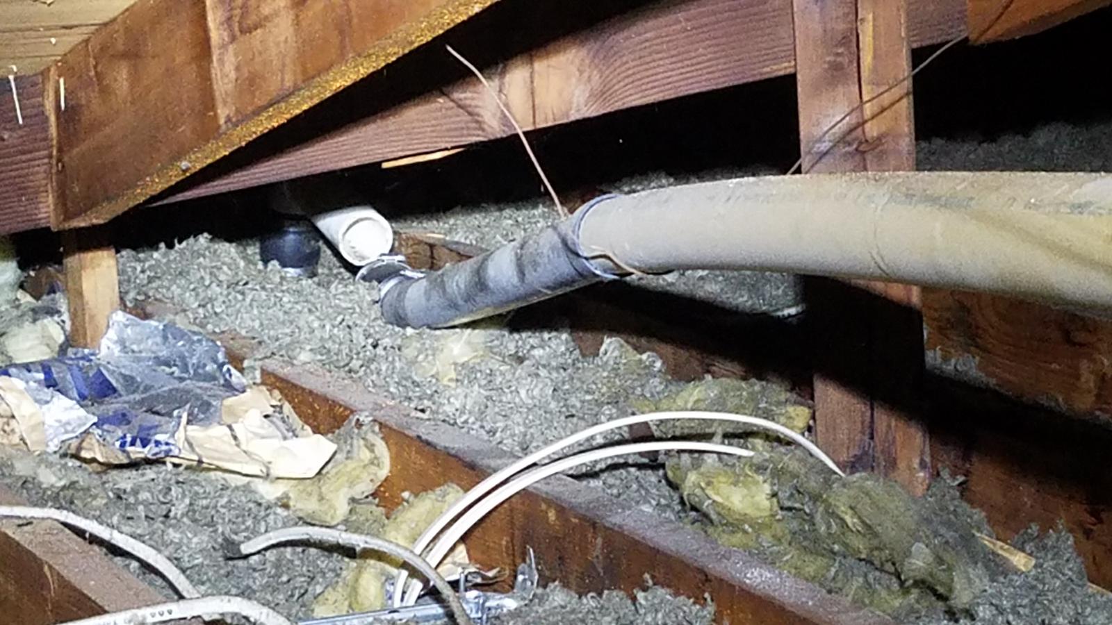 Not all our work in underground or under a house. Sometimes our work takes us into the attic. This is a separated drain vent line. A hard wind blew the neighbors trampoline over the house hitting the vent line causing it to separate in the attic!