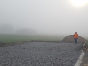 Our work starts before the sun rises. This is Randy at a ground rough-in early in the morning.