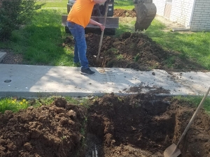 Actually, fixing a leak is the EASY part of plumbing. Finding the leak and getting to it is the hardest part. This pipe happened to burst under a sidewalk. This is randy doing his impression of a backhoe, lol. 