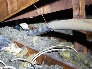 Not all our work in underground or under a house. Sometimes our work takes us into the attic. This is a separated drain vent line. A hard wind blew the neighbors trampoline over the house hitting the vent line causing it to separate in the attic!